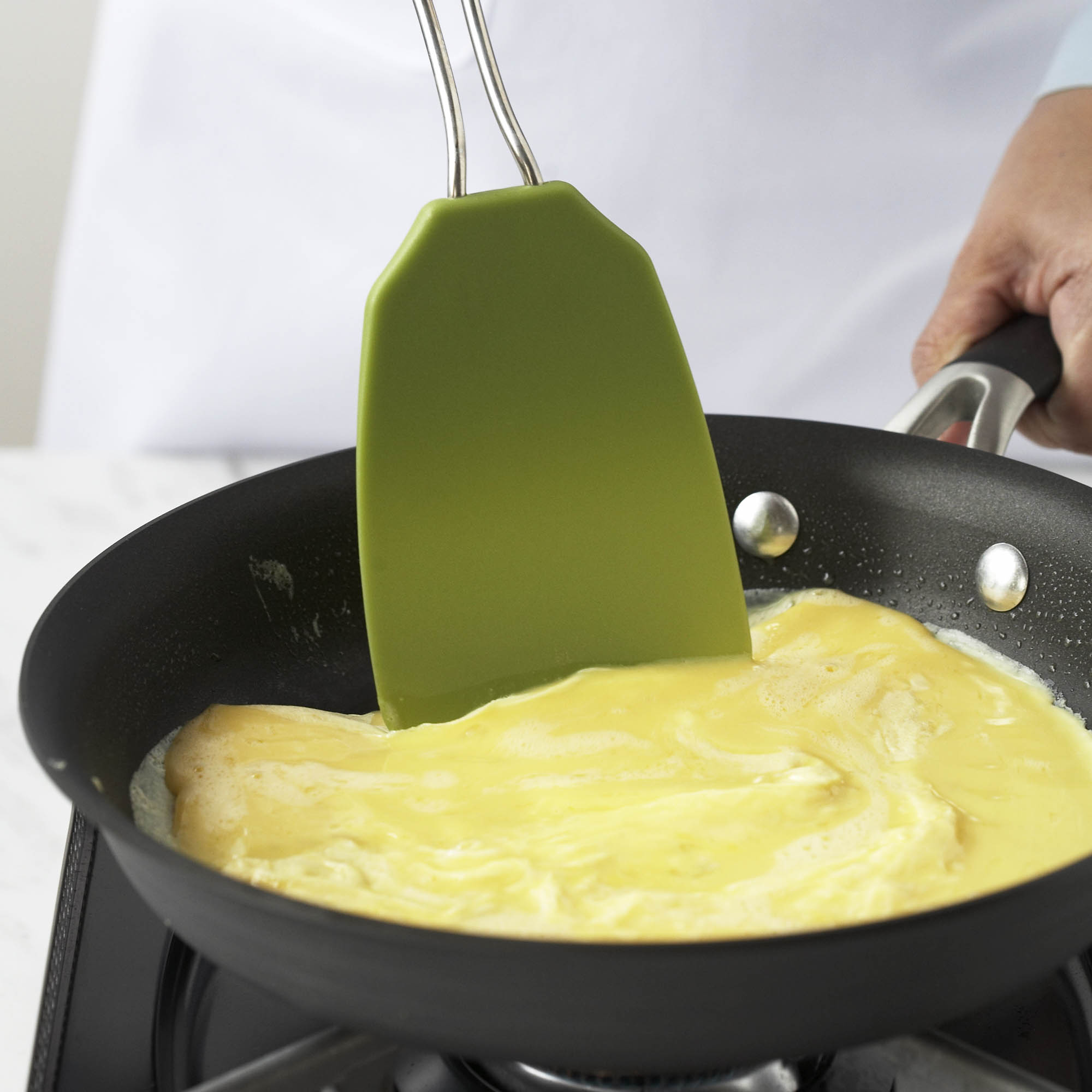 cooking eggs in a pan