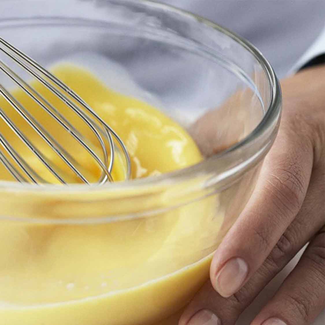 whisking eggs in a bowl