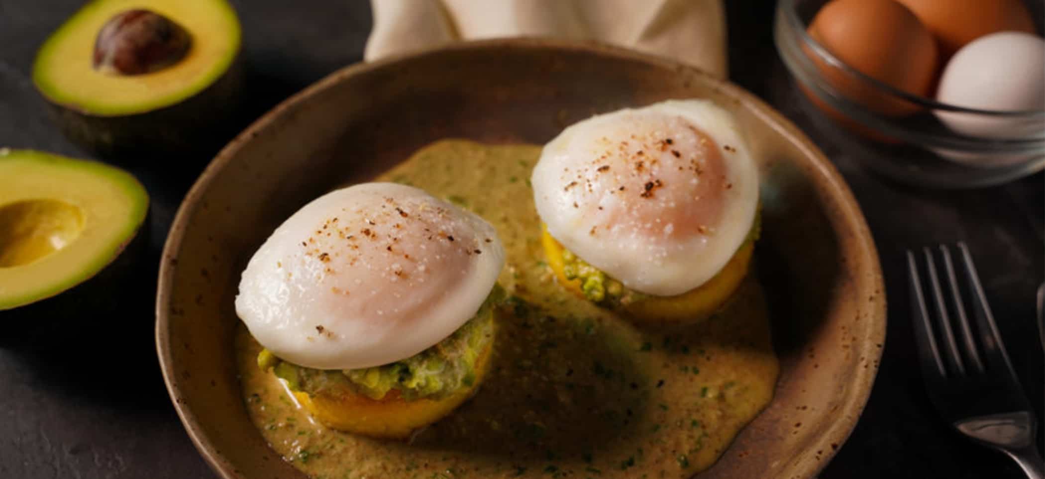 Polenta Cakes with Poached Eggs, Guacamole and Pumpkin Seed Salsa