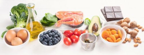 superfoods including eggs, blueberries, avocado, salmon, broccoli, and more