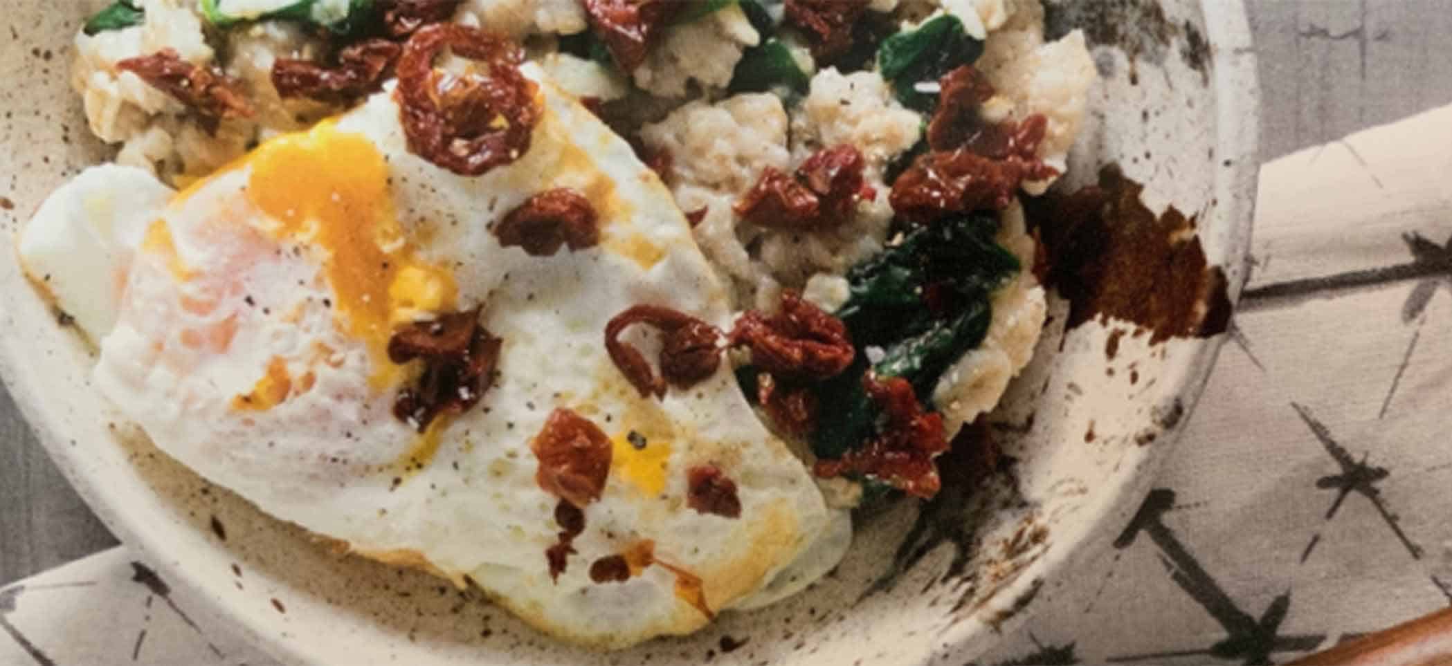 savory oatmeal with an egg on top