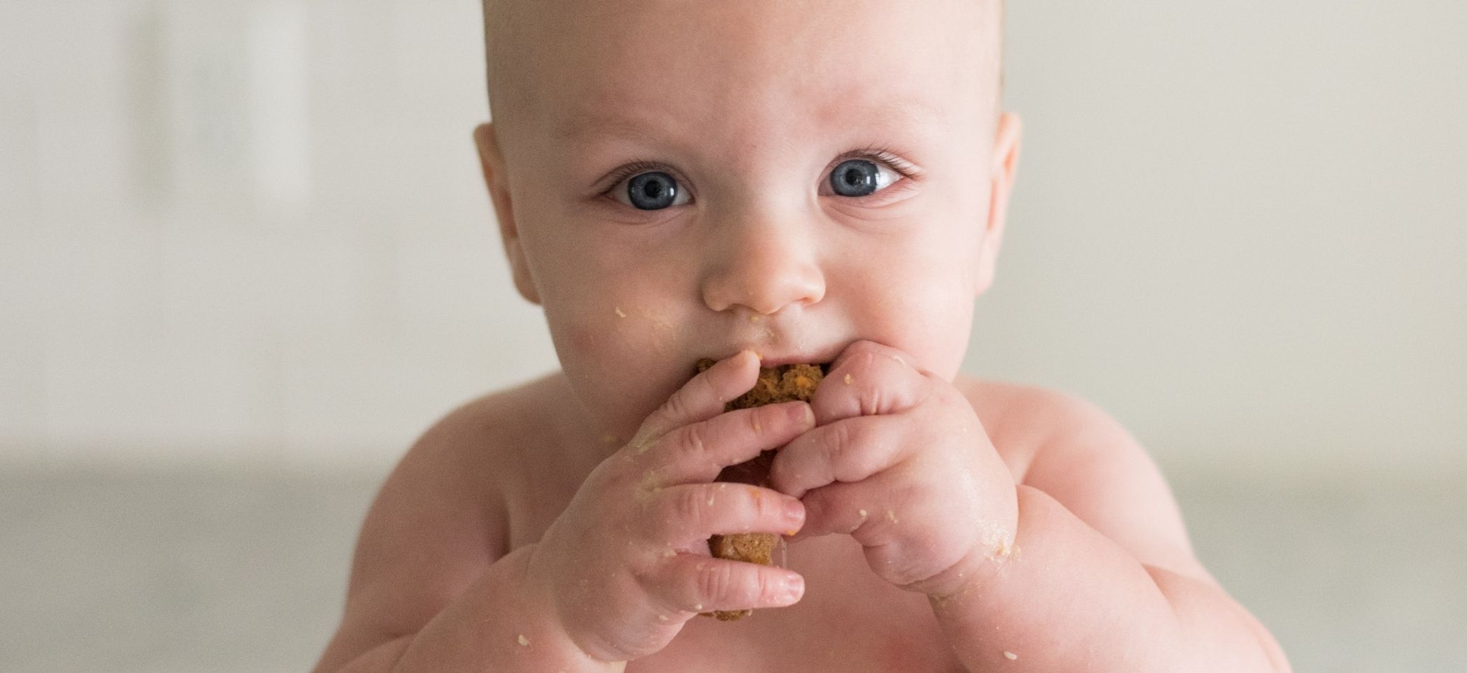 a baby eats food