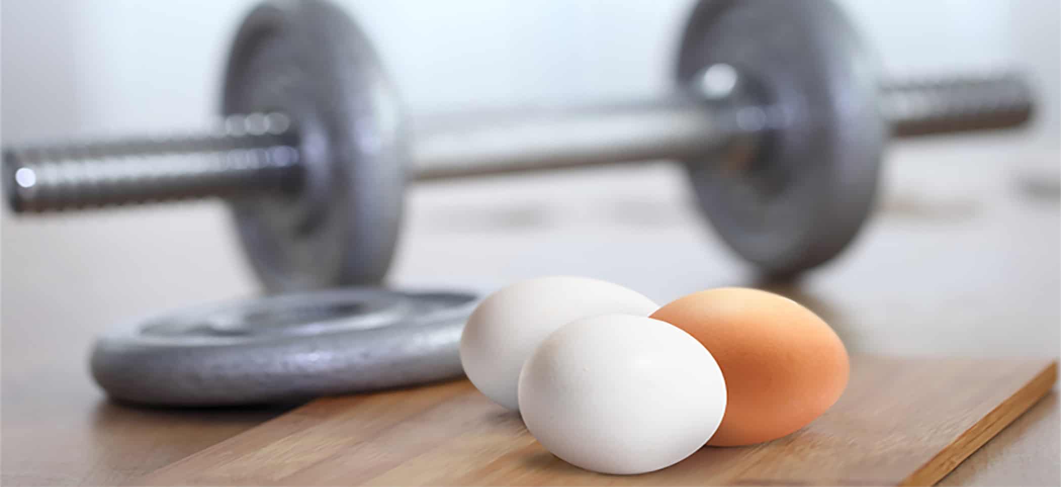 eggs next to a barbell