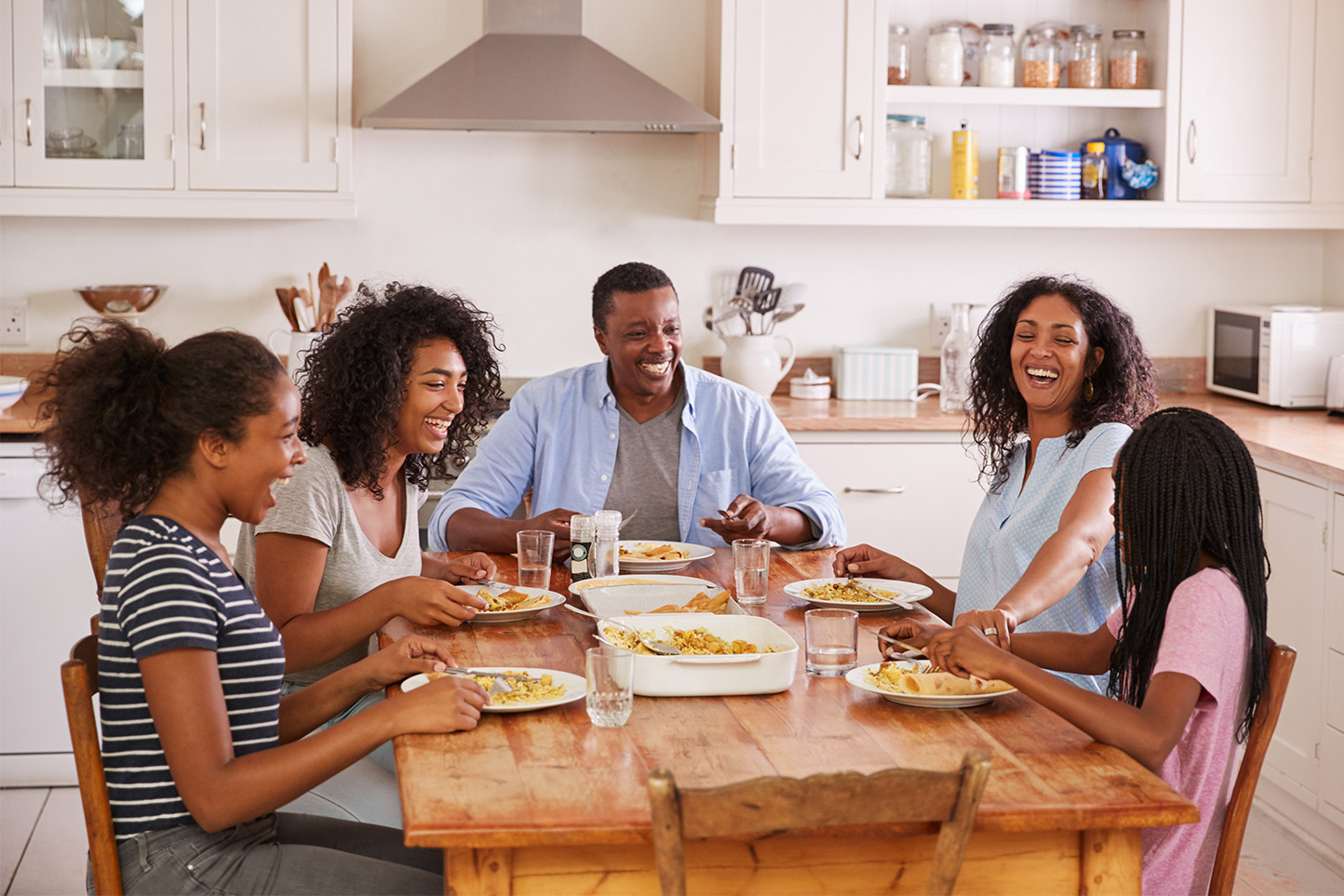 a family eating eggs for dinner