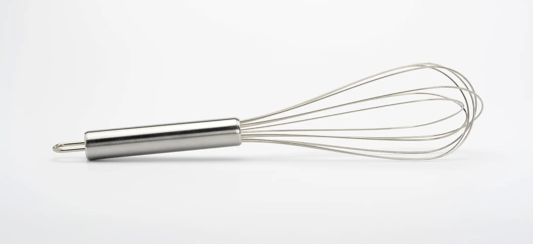 a whisk on a white background