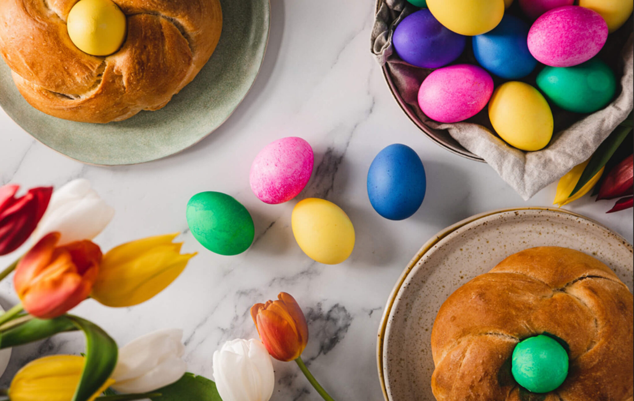 Colored Easter eggs on a marble table